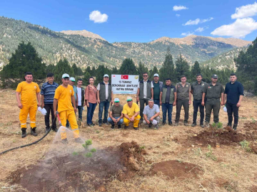 15 Temmuz Şehitleri için Saimbeyli’de fidanlar toprakla buluştu
